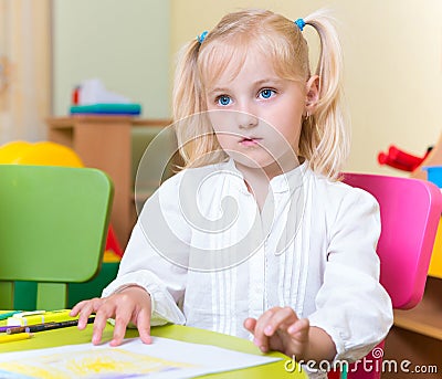 Portrait of little blonde girl with blue eyes Stock Photo