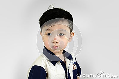 Fashionable child in casual shirt.stylish little boy with trendy haircut. Stock Photo