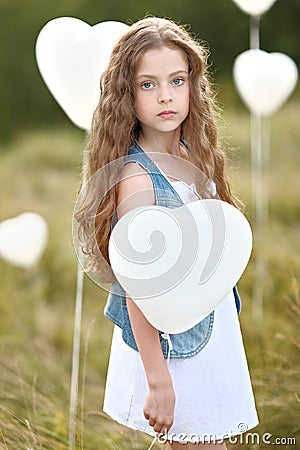Portrait of a little girl in a field Stock Photo