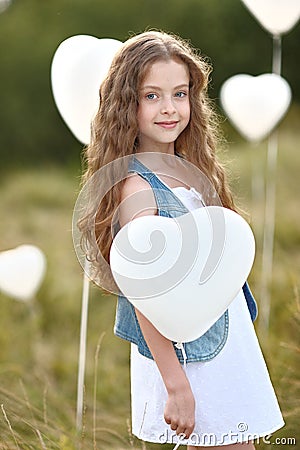 Portrait of a little girl in a field Stock Photo