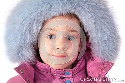 Portrait of little girl in furry hat Stock Photo