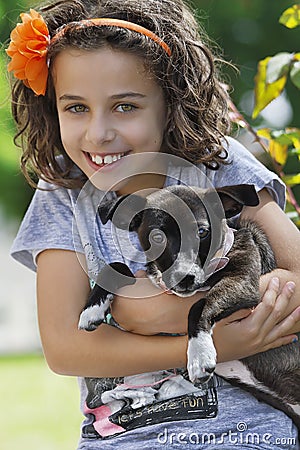 Portrait of little girl with her dog Stock Photo