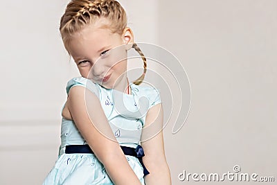 Portrait of a little girl toddler. Shyness, emotions Stock Photo