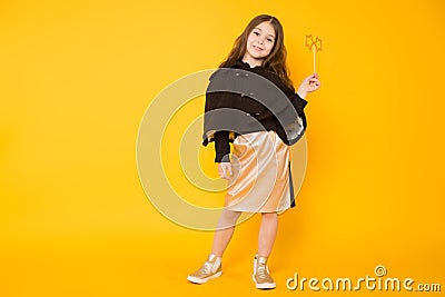 Little girl with toy star Stock Photo