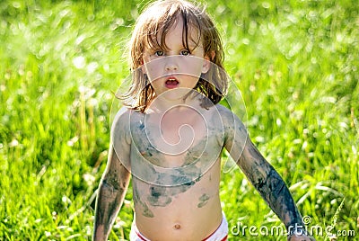 Portrait of a little messy girl painter Stock Photo