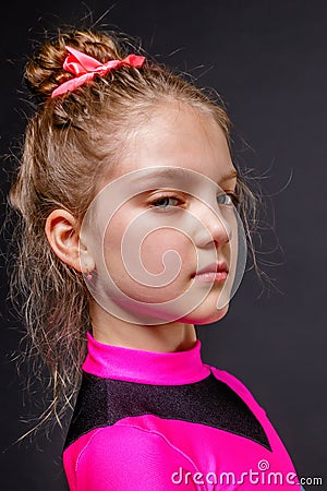 Portrait of little serious girl cheerleader Stock Photo