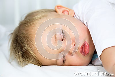 Portrait of Little Sleeping Baby Stock Photo