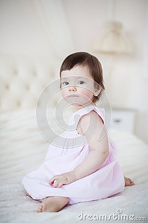 Portrait of a little sweet girl at home Stock Photo