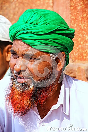 Portrait of a local man sitting in the courtyard of Jama Masjid Editorial Stock Photo