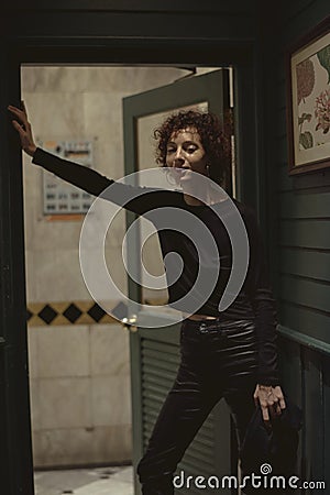 Portrait of a lone woman at a bar Stock Photo