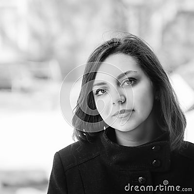 Portrait of a long-haired girl in a coat Stock Photo