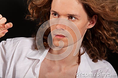 Portrait of long-haired handsome man Stock Photo