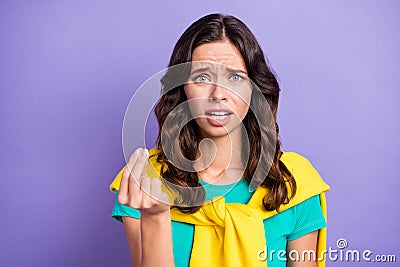 Portrait of lovely miserable angry wavy-haired girl saying pretense bad mood isolated over violet pastel color Stock Photo