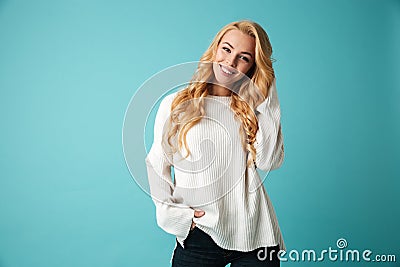 Portrait of a lovely young blonde woman in sweater Stock Photo