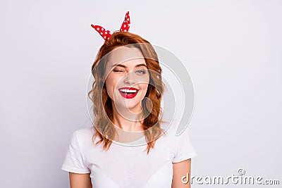 Portrait of lucky cute pretty woman wink blink enjoy summer free time holiday wear casual style clothes isolated over Stock Photo
