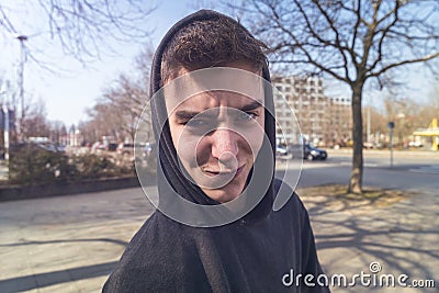 lucky young man with hoodie Stock Photo