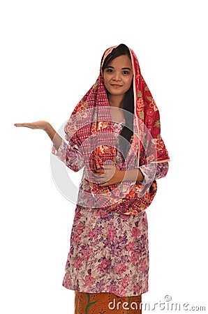 Portrait of a Malay woman with kebaya on white background Stock Photo