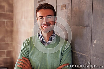 Portrait Of Male Designer Standing In Modern Office Stock Photo