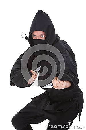 Portrait Of Male Ninja In Black Costume Stock Photo
