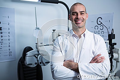 Portrait of male optometrist with arms crossed Stock Photo