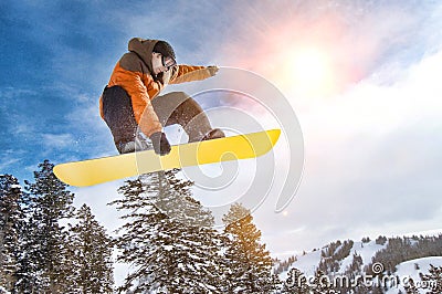Portrait of Male Snowboarder with lens flare Stock Photo