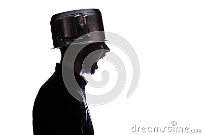 Portrait of a man with pan on his head Stock Photo