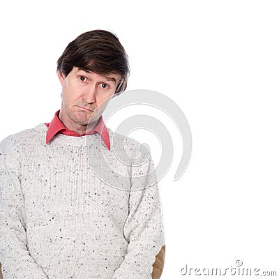 Portrait of a man in a sweater with a stupid look on his face Stock Photo