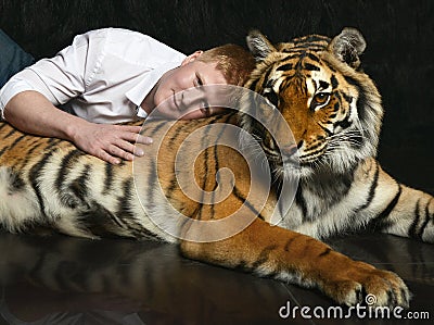 Portrait of man with tiger Stock Photo