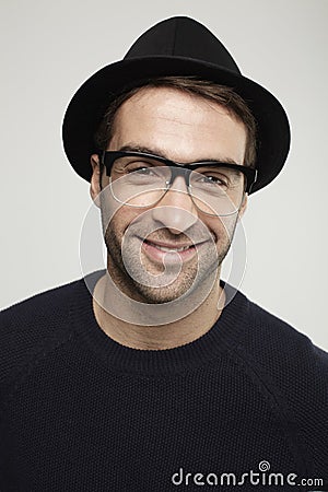 Portrait of man wearing glasses and hat Stock Photo