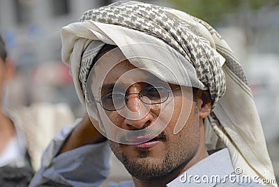 Portrait of a man wearing traditional head scarf in Taizz, Yemen. Editorial Stock Photo
