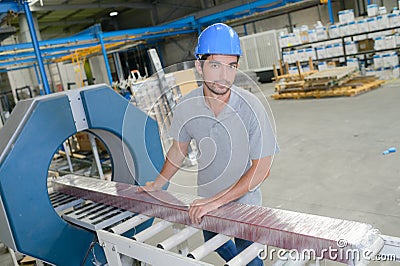 Portrait man working on production line Stock Photo