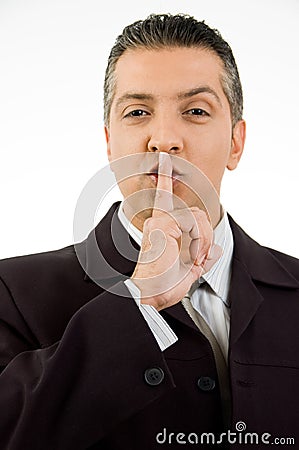 Portrait of manager instructing to be silent Stock Photo