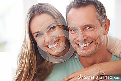 Portrait, married and couple hug, love and romance with support, happiness and trust at home. Face, man and woman Stock Photo