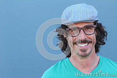 Portrait of mature modern man in office smiling Stock Photo