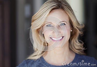 Portrait Of A Mature woman smiling Stock Photo