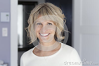 Portrait Of A Mature Woman Smiling At the Camera Stock Photo