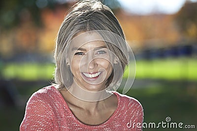 Portrait Of A Mature Woman Smiling At The Camera. Stock Photo