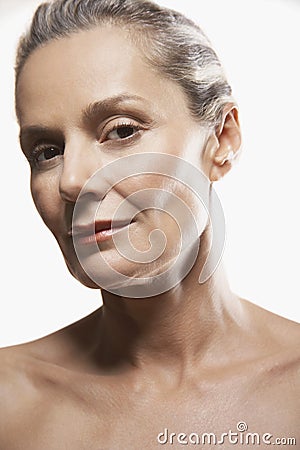 Portrait of Middle-Aged Woman head tilted to side Stock Photo