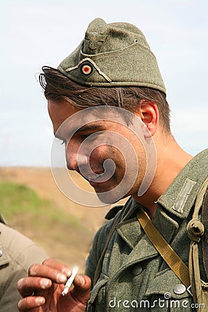 Portrait of a military re - enactor in German uniform world war II. German soldier. Editorial Stock Photo