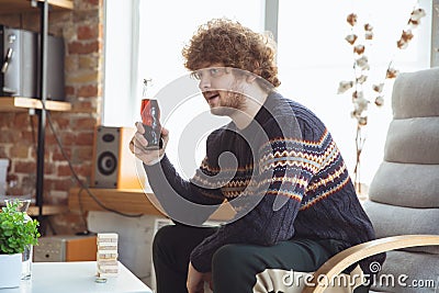 Portrait of millenial boy with retro style, meeting things from the past and having fun, nostalgic the lifestyle of the Stock Photo