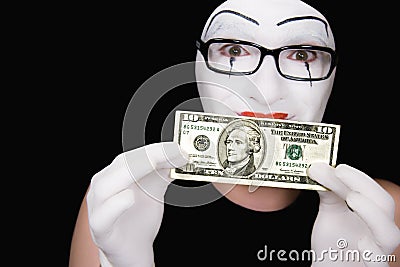 Portrait of mime with 10 dollar denomination Stock Photo