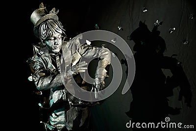 Portrait of mime artist performing art on black background Stock Photo