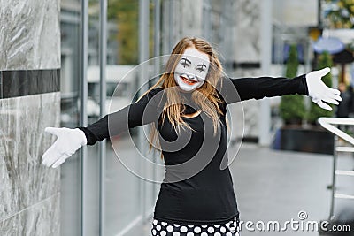 Portrait of a mime comedian. mime girl on the street Stock Photo