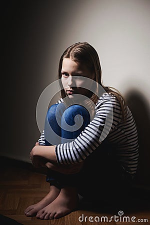 Portrait of a miserable little girl Stock Photo
