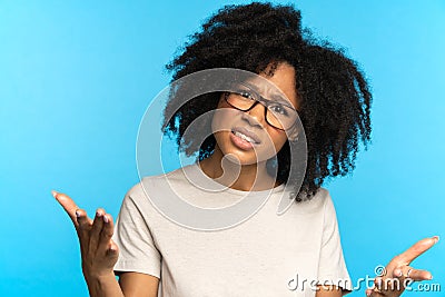 Portrait of mixed race shocked female with frowning open mouth, angry surprised face expression Stock Photo