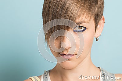 Portrait of a girl with short hair and serious expression Stock Photo