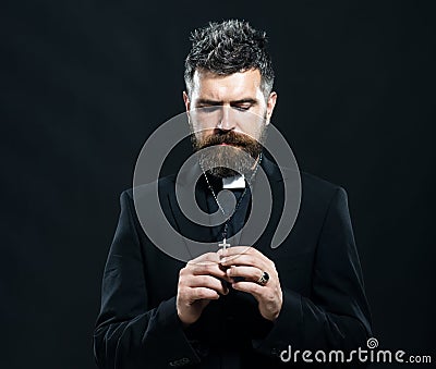 Portrait of monk with pray. Pray praying oblation. Senior religion holy man with a confident expression. Isolated. Stock Photo