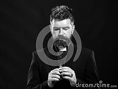 Portrait of monk with pray. Pray praying oblation. Senior religion holy man with a confident expression. Isolated. Stock Photo