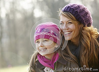 Portrait mother and daughter outdoors in winter Stock Photo