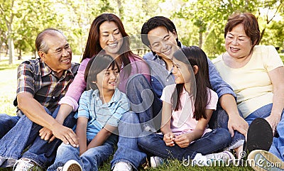 Portrait multi-generation Asian family in park Stock Photo